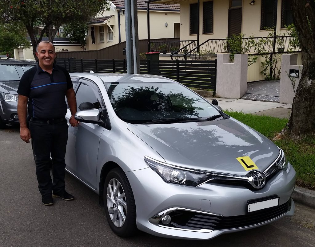 driving-instructor-kingsford-with-vehicle-georges